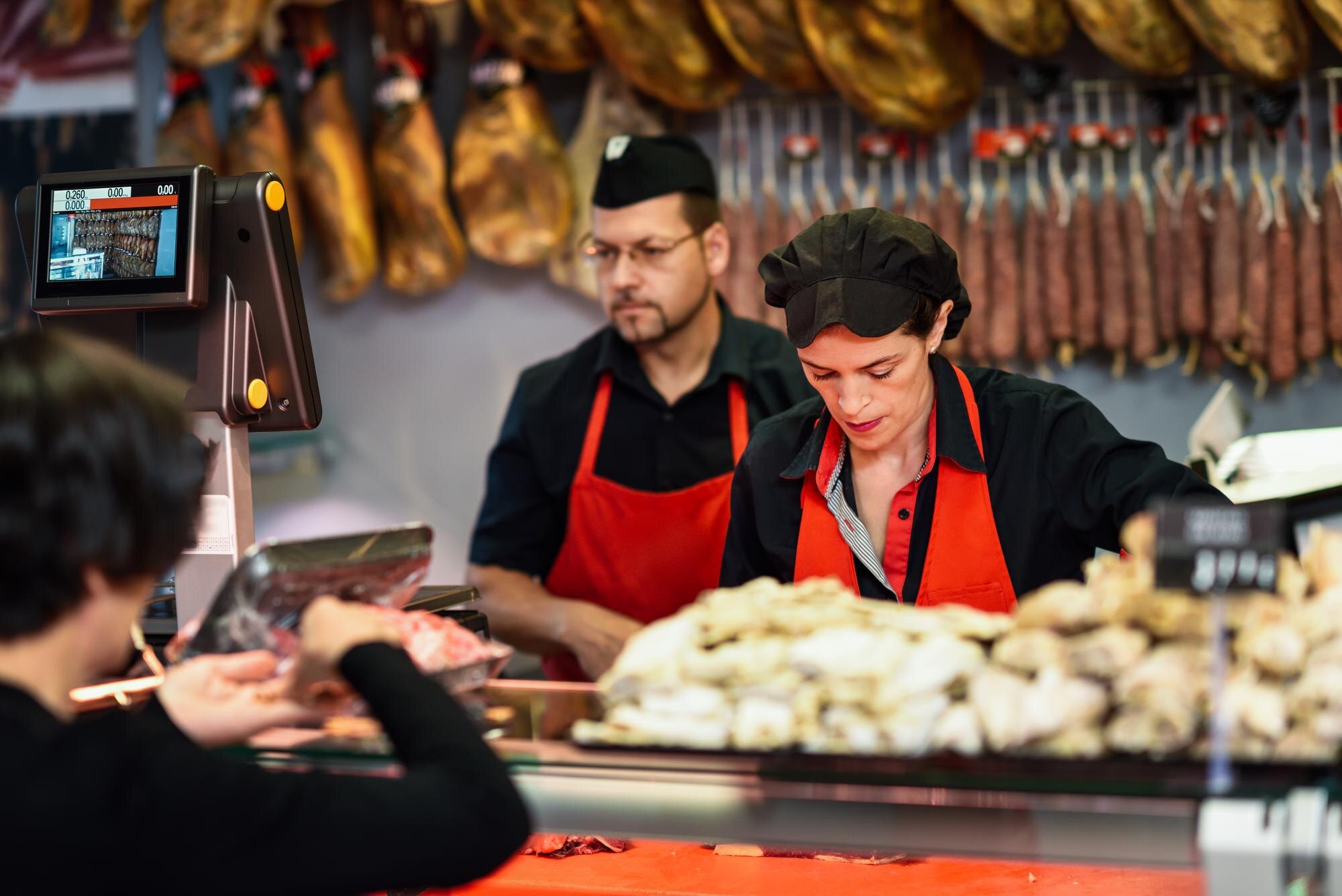 owners selling food butcher shop 1048944 3638058